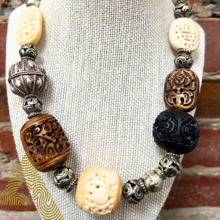 Antique Yemeni pure silver bead stamped with its maker's signature, with vintage carved beads, detail of Biodiversity